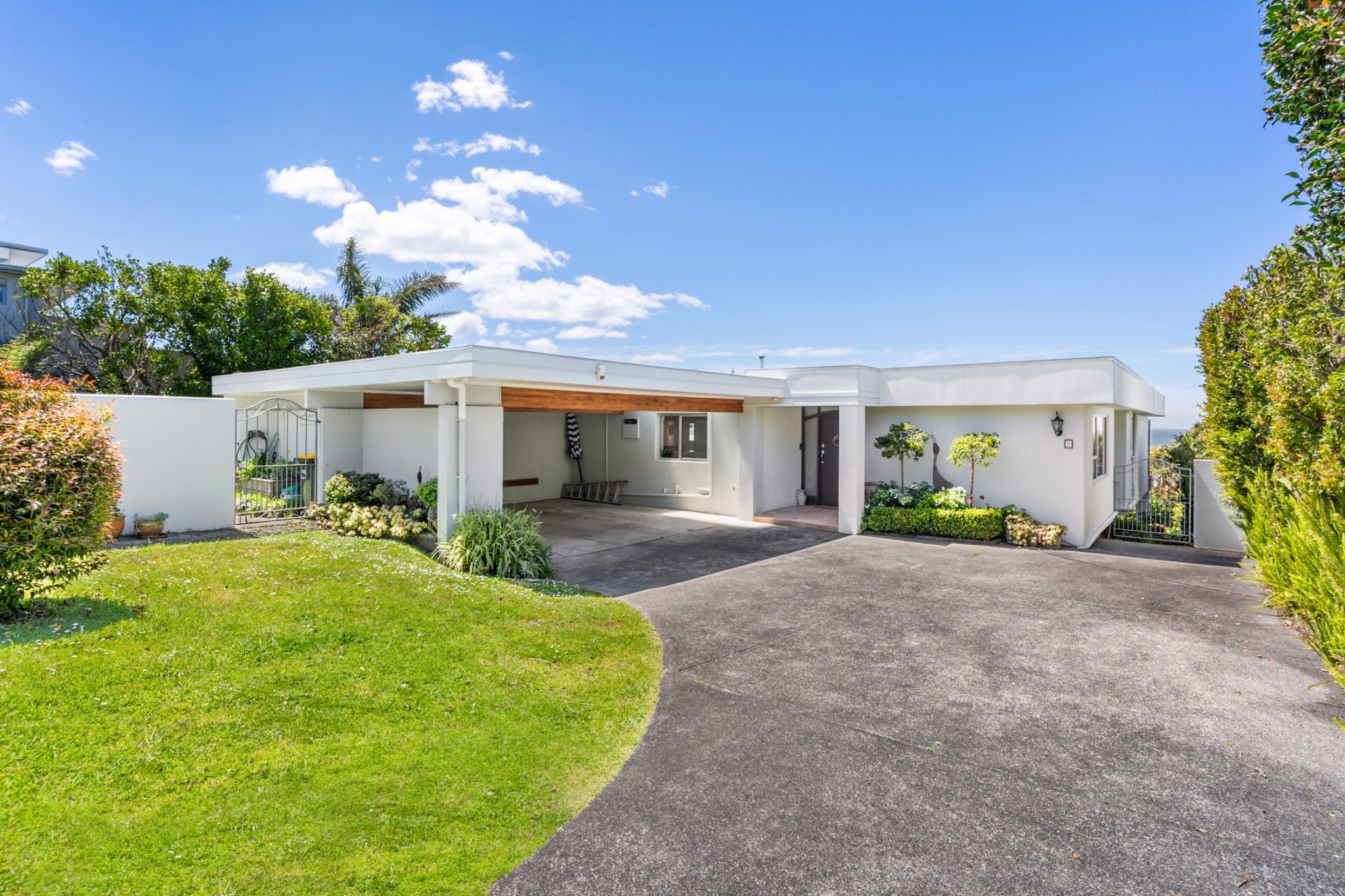 Existing rear exterior of the Castor Bay home